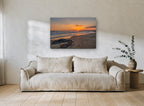 Footprints at Sunset Shore coastal canvas print on the wall of a living room