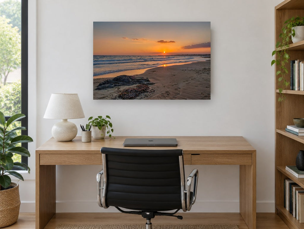Footprints at Sunset Shore coastal canvas print on the wall of a study
