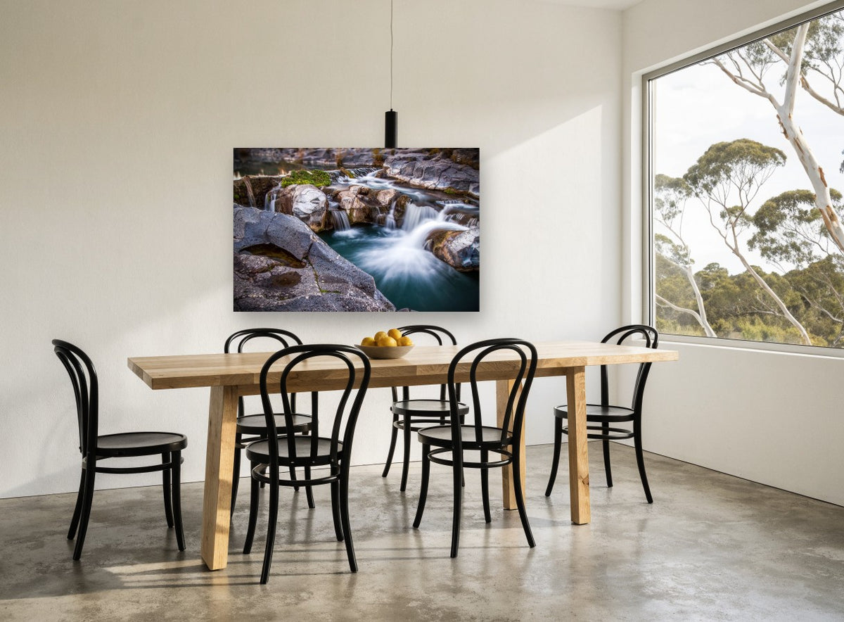 Silken Rock Pools landscape canvas print on the wall of a dining room