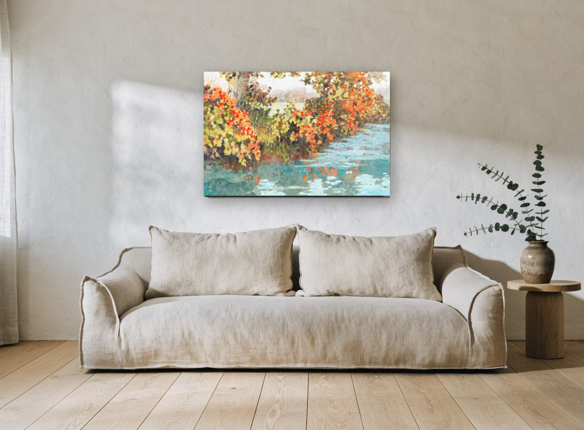 Autumn Creek Reflections floral canvas print on the wall of a living room