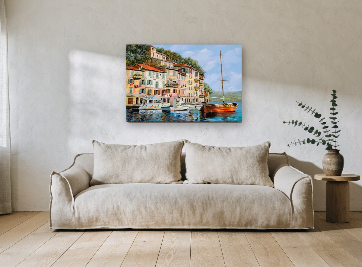 Red Sailboat Harbour landscape canvas print on the wall of a living room