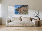 Positano Hillside Village coastal canvas print on the wall of a living room