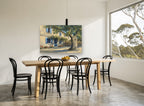 Shaded Courtyard Bicycle floral canvas print on the wall of a dining room