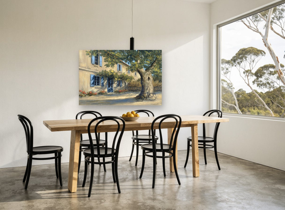 Shaded Courtyard Bicycle floral canvas print on the wall of a dining room