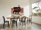 Charging Arena Bull floral canvas print on the wall of a dining room