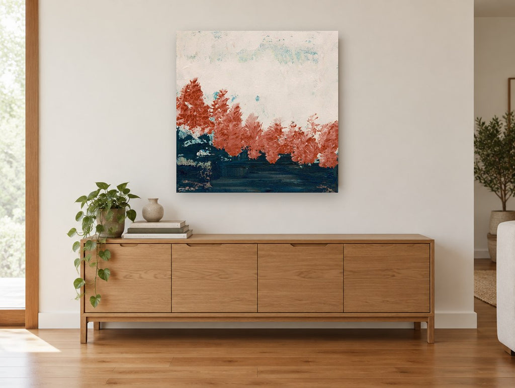 Rust Trees at Dusk floral canvas print on the wall of a living room above a sideboard