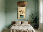 Three Proteas in Teal floral canvas print on the wall of a bedroom