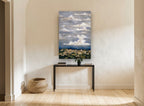 Clouds Over the Hill Town landscape canvas print on the wall of a hallway