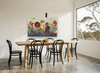 Poppies Adrift floral canvas print on the wall of a dining room