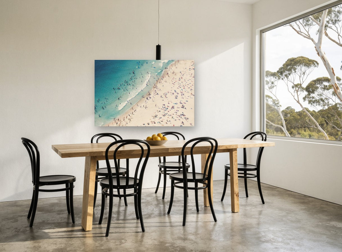 Crowded Summer Shore coastal canvas print on the wall of a dining room