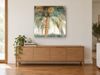 Coconut Palm Canopy landscape canvas print on the wall of a living room above a sideboard