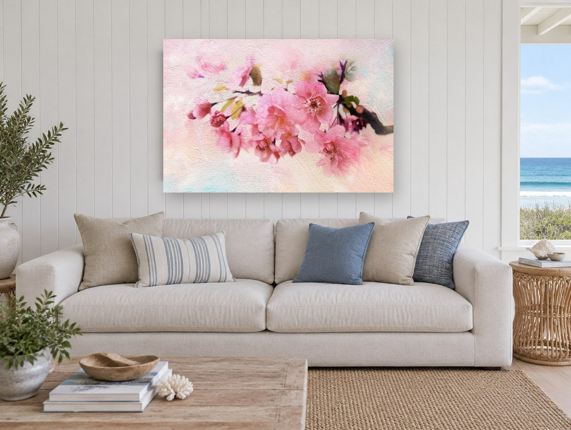 Blush Apple Blossom Branch floral canvas print on the wall of a beach house living room