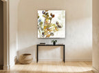 Script and Leaf Sprigs vintage canvas print on the wall of a hallway