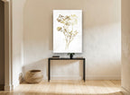 Golden Meadow Sprigs floral canvas print on the wall of a hallway