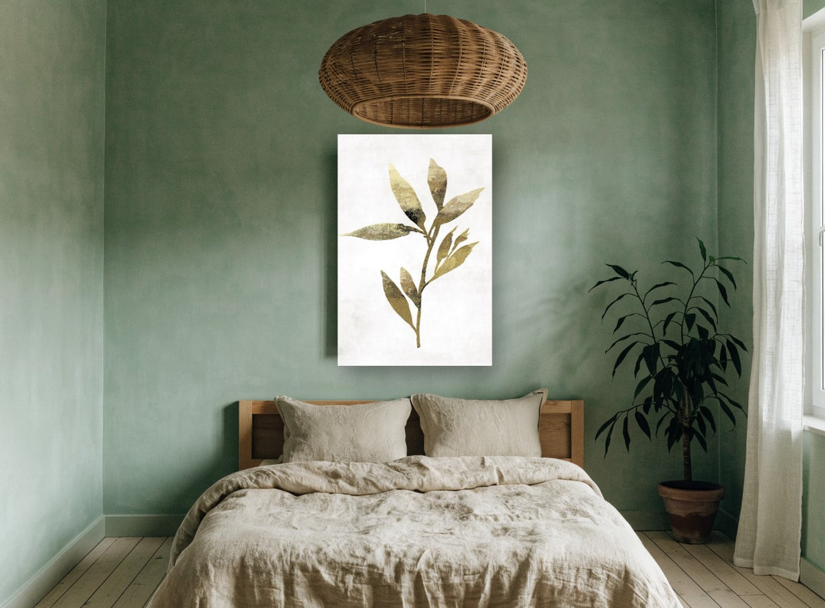 Gilded Olive Sprig floral canvas print on the wall of a bedroom