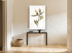 Gilded Olive Sprig floral canvas print on the wall of a hallway