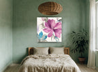 Magenta Bloom Wash floral canvas print on the wall of a bedroom