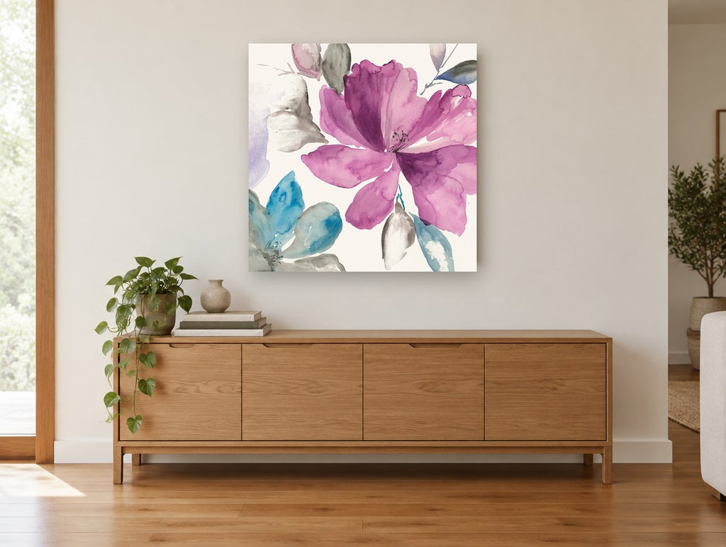 Magenta Bloom Wash floral canvas print on the wall of a living room above a sideboard