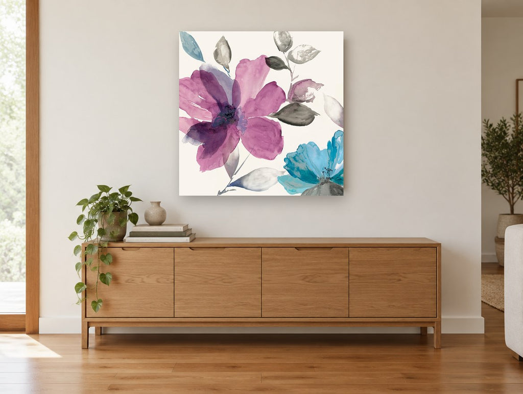 Plum and Teal Blooms floral canvas print on the wall of a living room above a sideboard