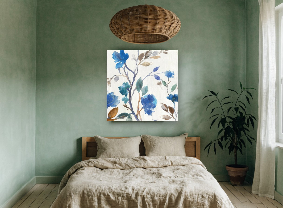 Cobalt Blossom Branches floral canvas print on the wall of a bedroom