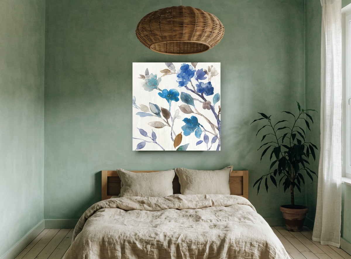 Azure Petal Drift floral canvas print on the wall of a bedroom