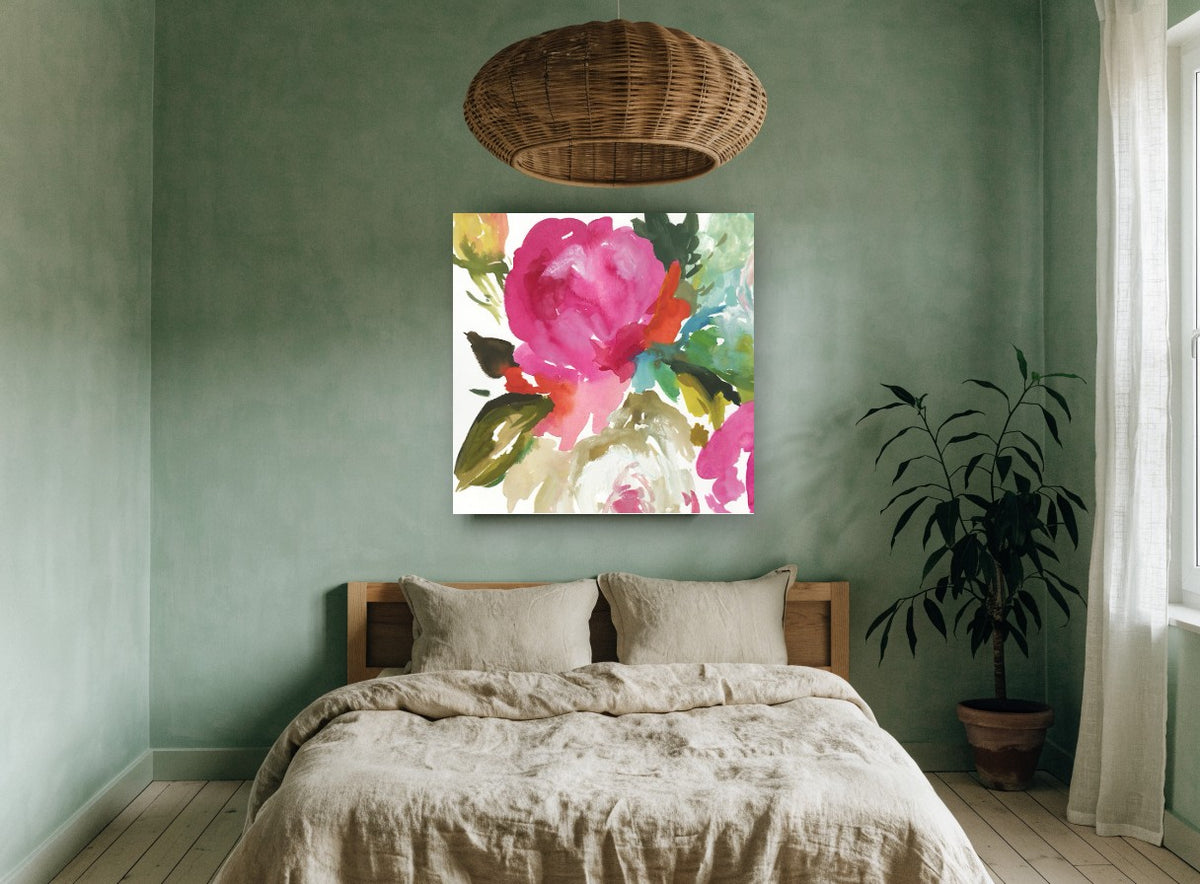 Magenta Bloom Wash floral canvas print on the wall of a bedroom