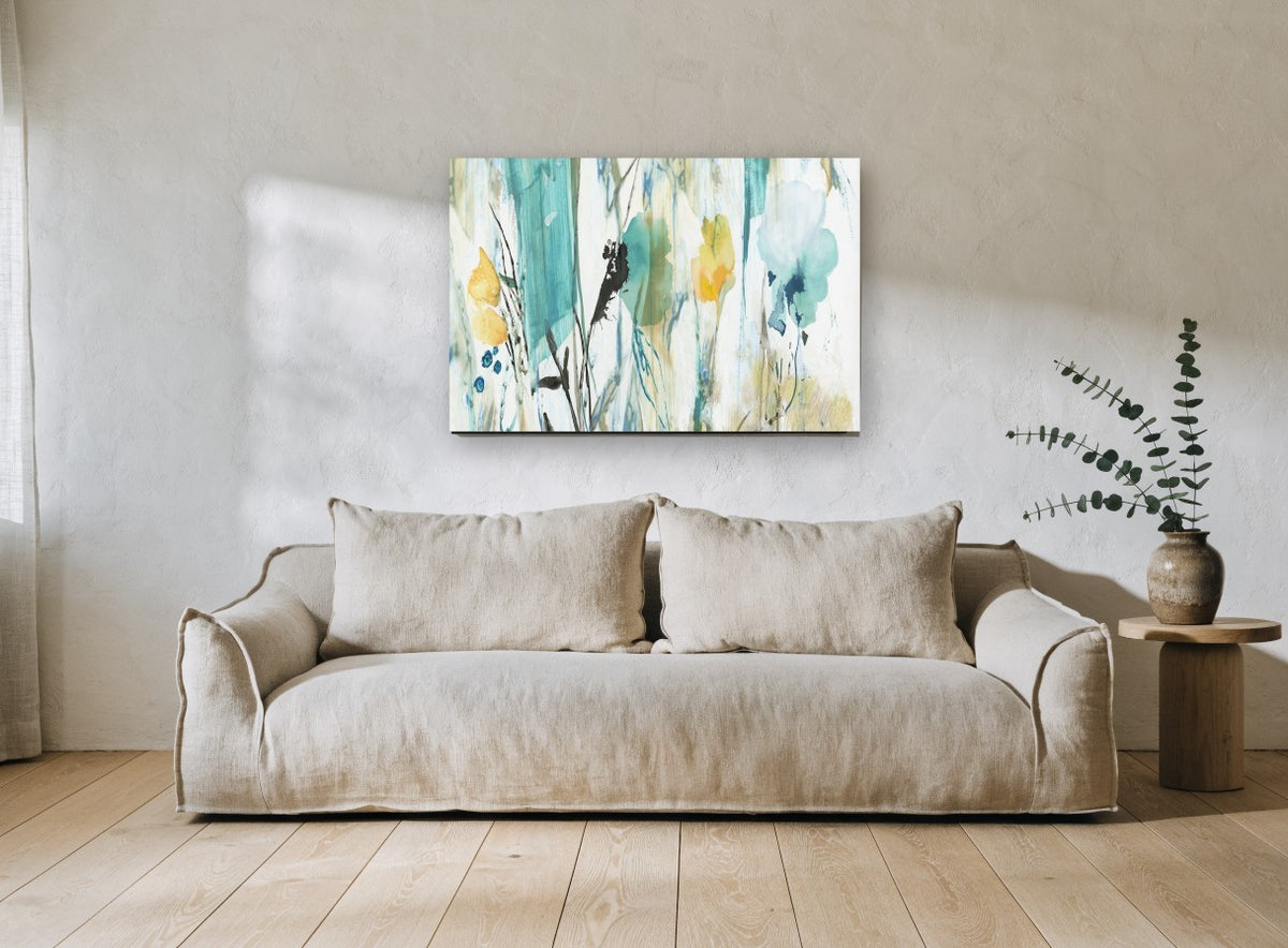 Teal Meadow Wash floral canvas print on the wall of a living room