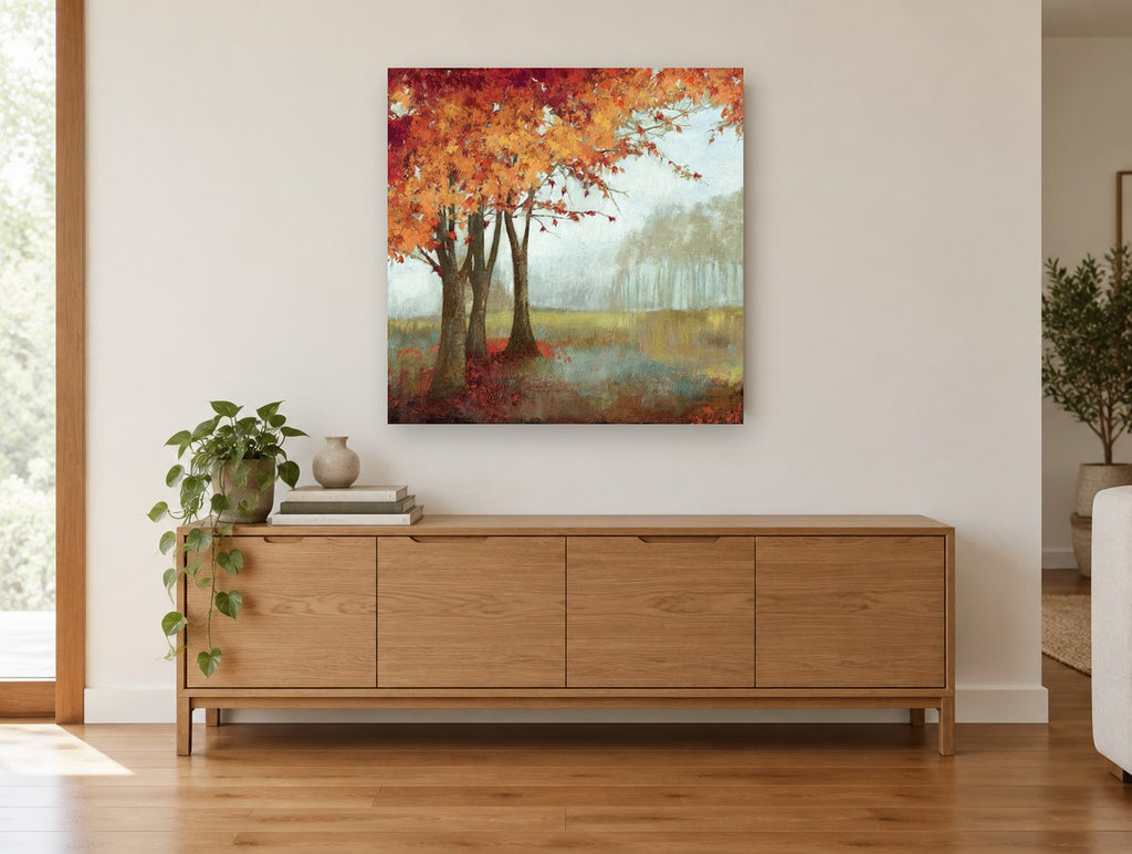 Autumn Maples in Mist floral canvas print on the wall of a living room above a sideboard