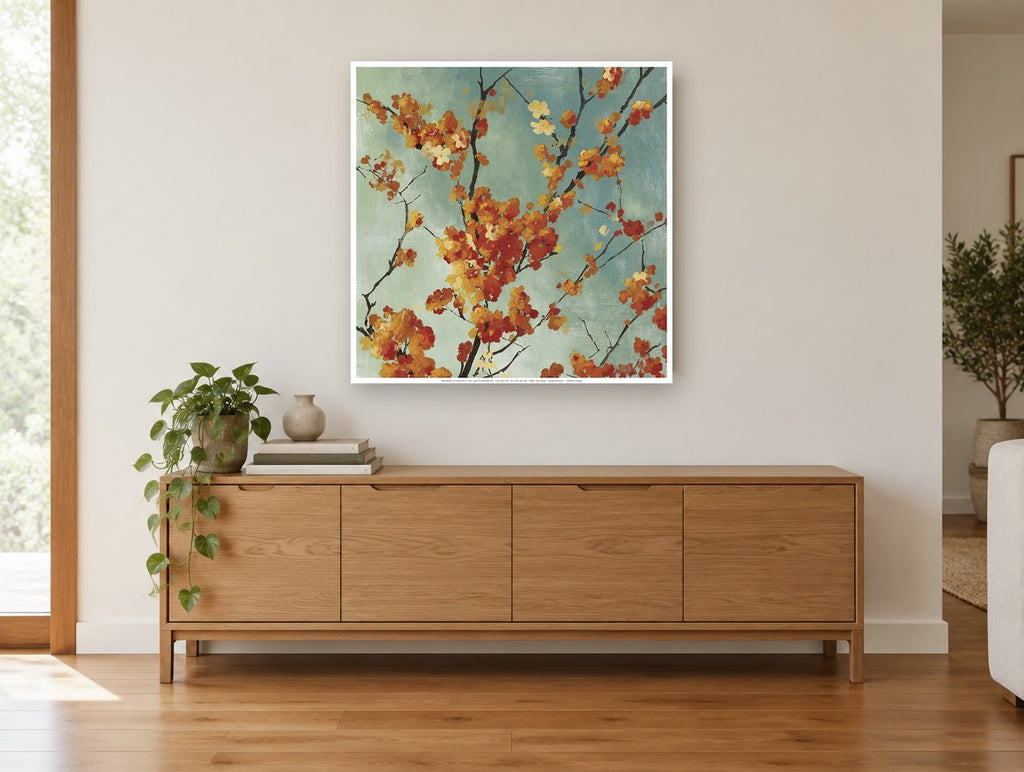 Autumn Blossom Branches floral canvas print on the wall of a living room above a sideboard