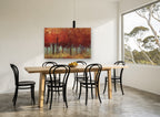 Crimson Grove Glow floral canvas print on the wall of a dining room