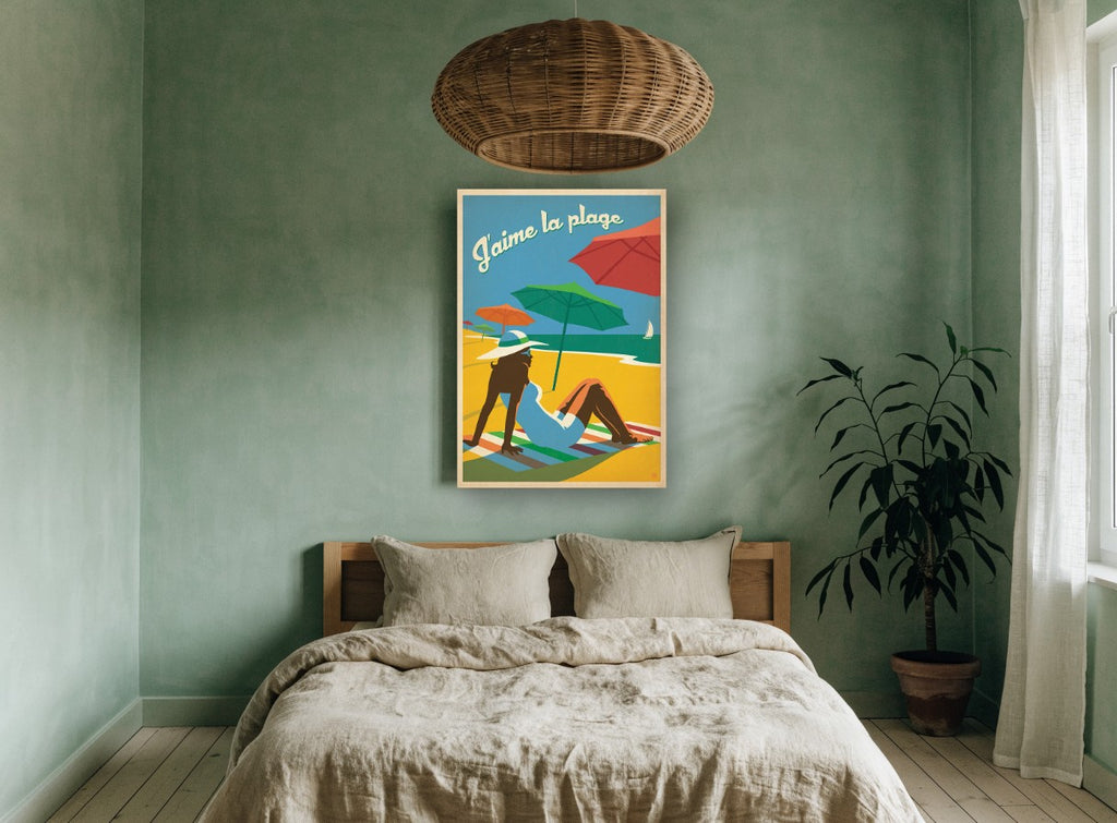 J'aime la Plage vintage canvas print on the wall of a bedroom