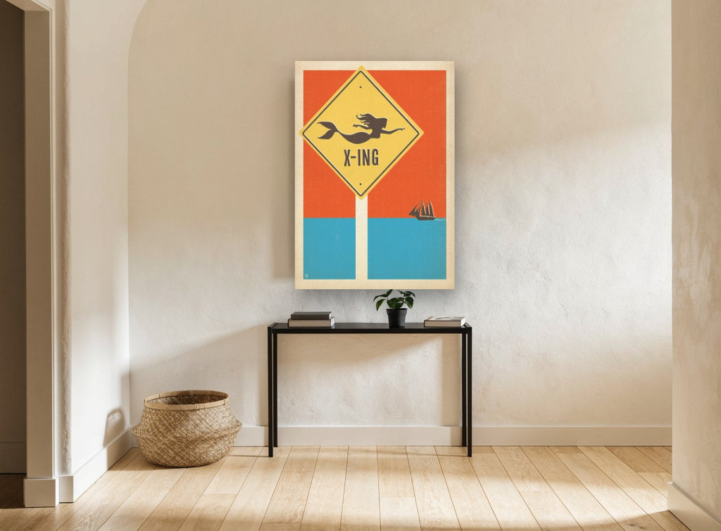 Mermaid X-ing Sign vintage canvas print on the wall of a hallway