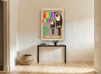 Toucan Pair Rainbow Beaks vintage canvas print on the wall of a hallway