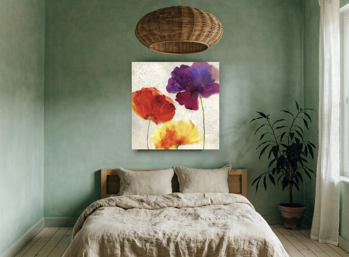 Trio of Poppies floral canvas print on the wall of a bedroom