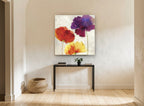 Trio of Poppies floral canvas print on the wall of a hallway