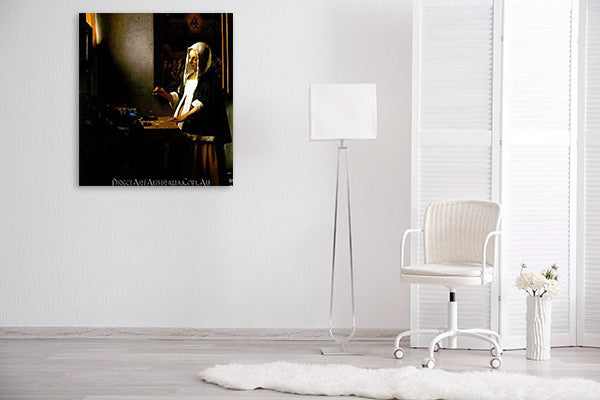 Jan Vermeer | Woman Holding a Balance on the wall
