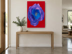 Violet Bloom on Red floral canvas print on the wall of a entry hall