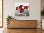 Crimson Poppies in Grey floral canvas print on the wall of a living room above a sideboard