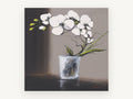 White Orchid in Glass, floral canvas wall art print, front view