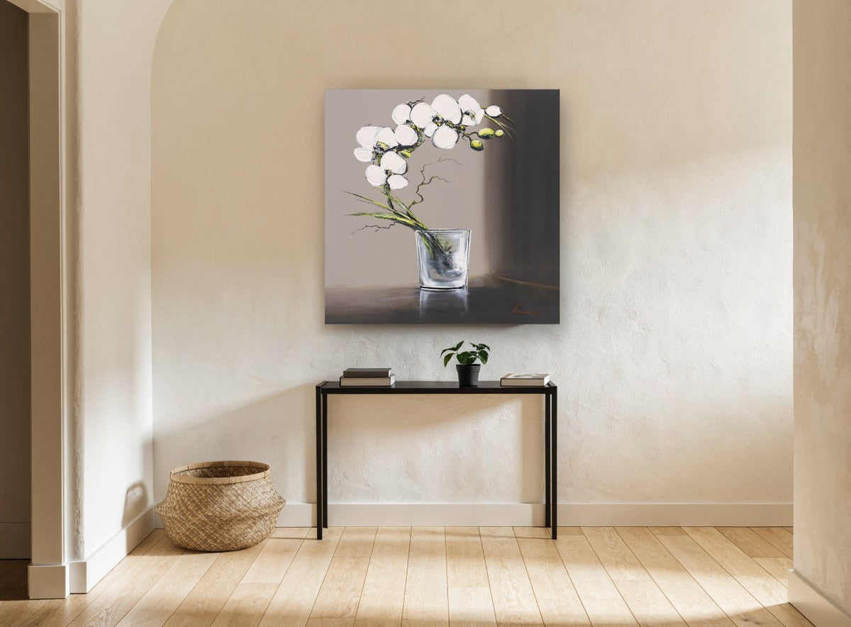 White Orchid in Glass floral canvas print on the wall of a hallway