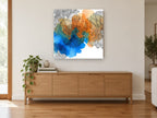 Dahlia Ink and Wash floral canvas print on the wall of a living room above a sideboard