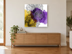 Dahlia Ink Wash floral canvas print on the wall of a living room above a sideboard