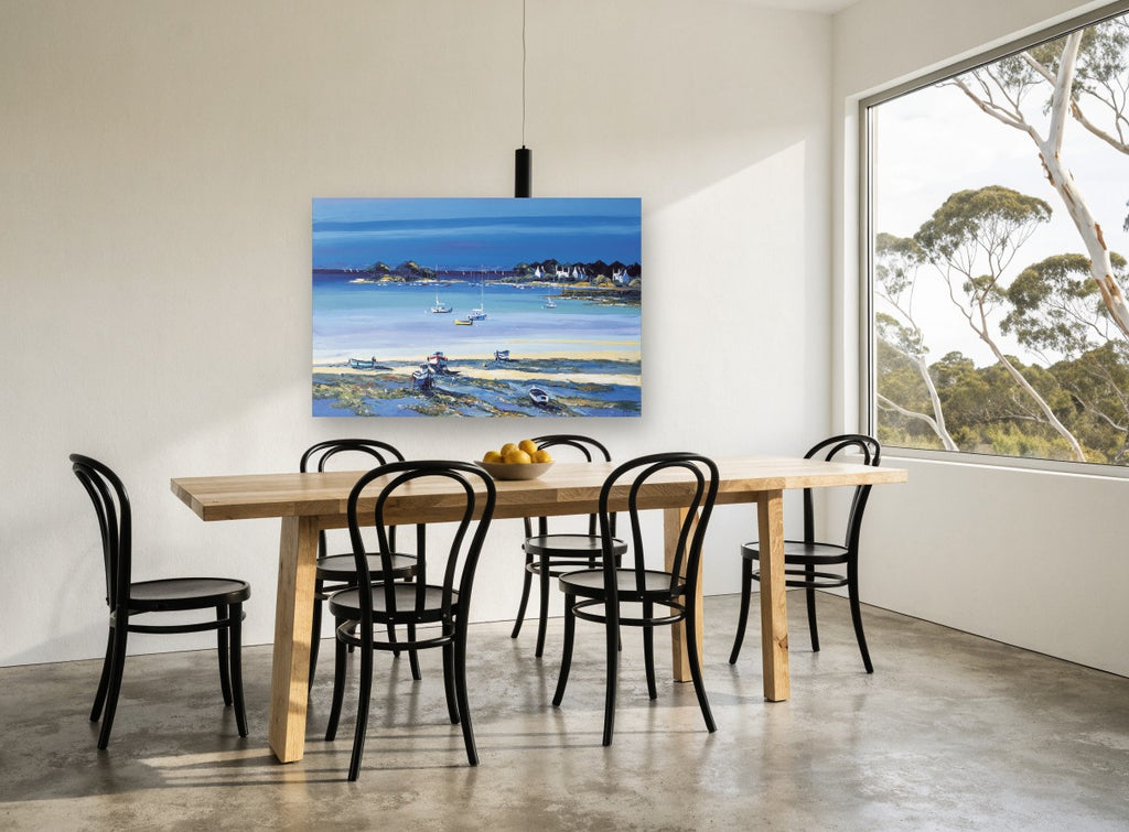 Low Tide Moorings coastal canvas print on the wall of a dining room