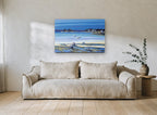 Low Tide Moorings coastal canvas print on the wall of a living room