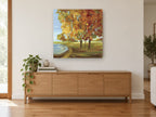 Autumn Mosaic Park landscape canvas print on the wall of a living room above a sideboard