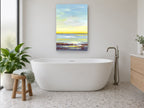 Golden Horizon Shoreline coastal canvas print on the wall of a bathroom