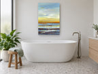Amber Horizon Bands coastal canvas print on the wall of a bathroom