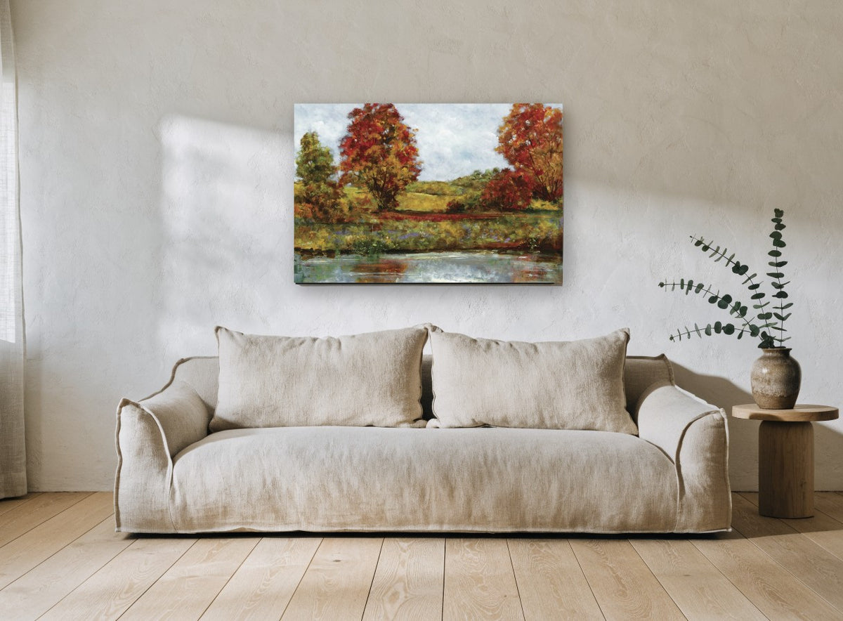 Autumn Pond Edge floral canvas print on the wall of a living room