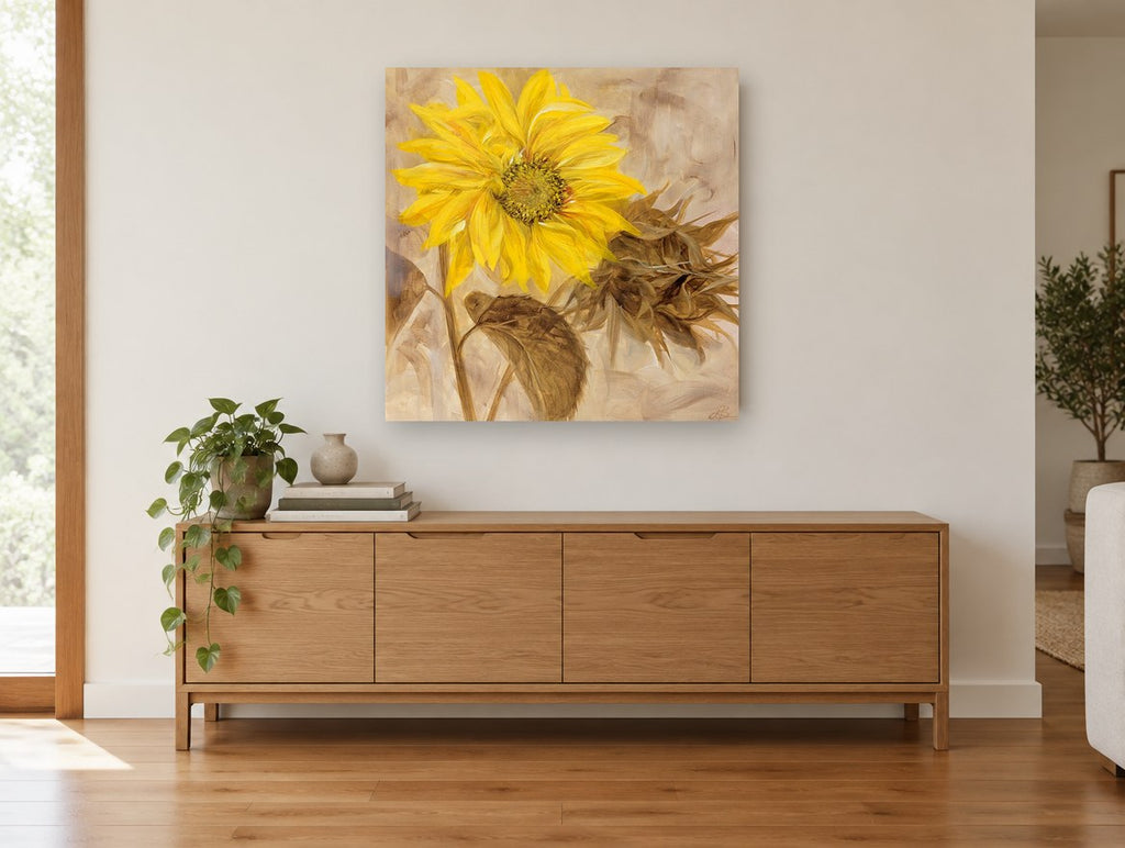 Golden Sunflower Study floral canvas print on the wall of a living room above a sideboard