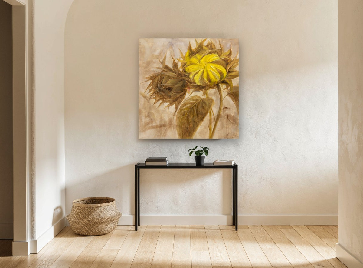Turned Sunflower Bud floral canvas print on the wall of a hallway